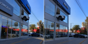 CARRO ATRAVESSA VITRINE E FICA PENDURADO NO SEGUNDO ANDAR